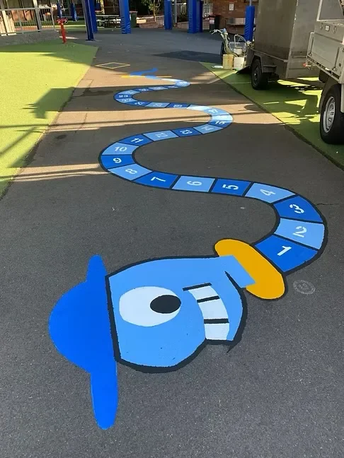 Blue numbered snake playground marking at a school